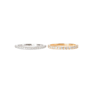Half eternity lab diamond pave band in white and yellow gold.