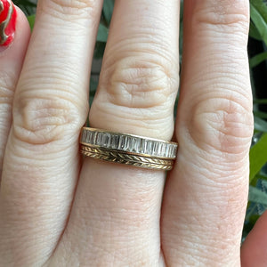 Yellow gold flat wedding band, with hand wheat engraving inspired by the Art Deco period. Stacked on the hand with Athens Half Eternity Band.