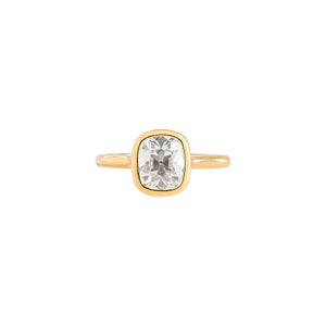 Yellow gold bezel set engagement ring with an antique cushion or Old Mine Cut lab diamond or moissanite.