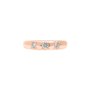 Rose gold domed band featuring three shimmering bead-set lab diamonds inside of star settings.