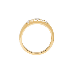 Yellow gold domed band featuring three shimmering bead-set lab diamonds inside of star settings. Gallery view.