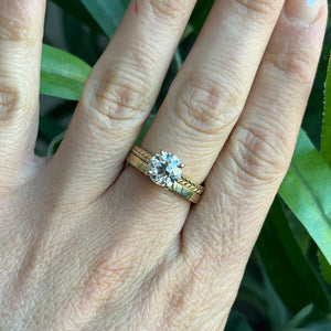 Yellow gold Old European Cut  cathedral engagement ring, with hand wheat engraving inspired by the Art Deco period. Stacked on hand with Cartagena 2mm band.