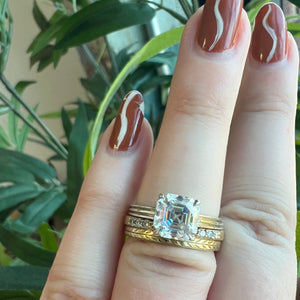Shown on hand: Finn Asscher Engagement Ring with Pave Gap Wedding Band and Yara Wedding Band 