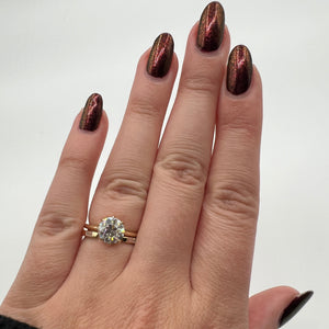 Simone Round Engagement Ring Shown Stacked with Baguette Gap Wedding Band