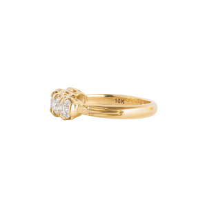 Yellow gold eternity band with five Old Mine Cut moissanite or lab diamond or cushion lab diamonds. Side view.