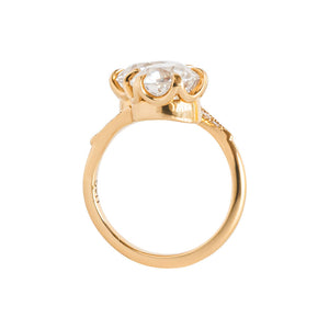 Two-stone toi et moi yellow gold engagement ring set with Old European Cut round moissanite or lab diamonds with one on top of the other. Triangle-shaped sides with lab diamonds. Gallery view.