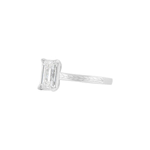 White gold emerald cut engagement ring, with hand wheat engraving inspired by the Art Deco period.