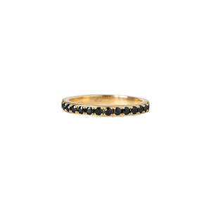 Matte yellow gold half eternity surface prong pave band, set with black moissanite. Front view.